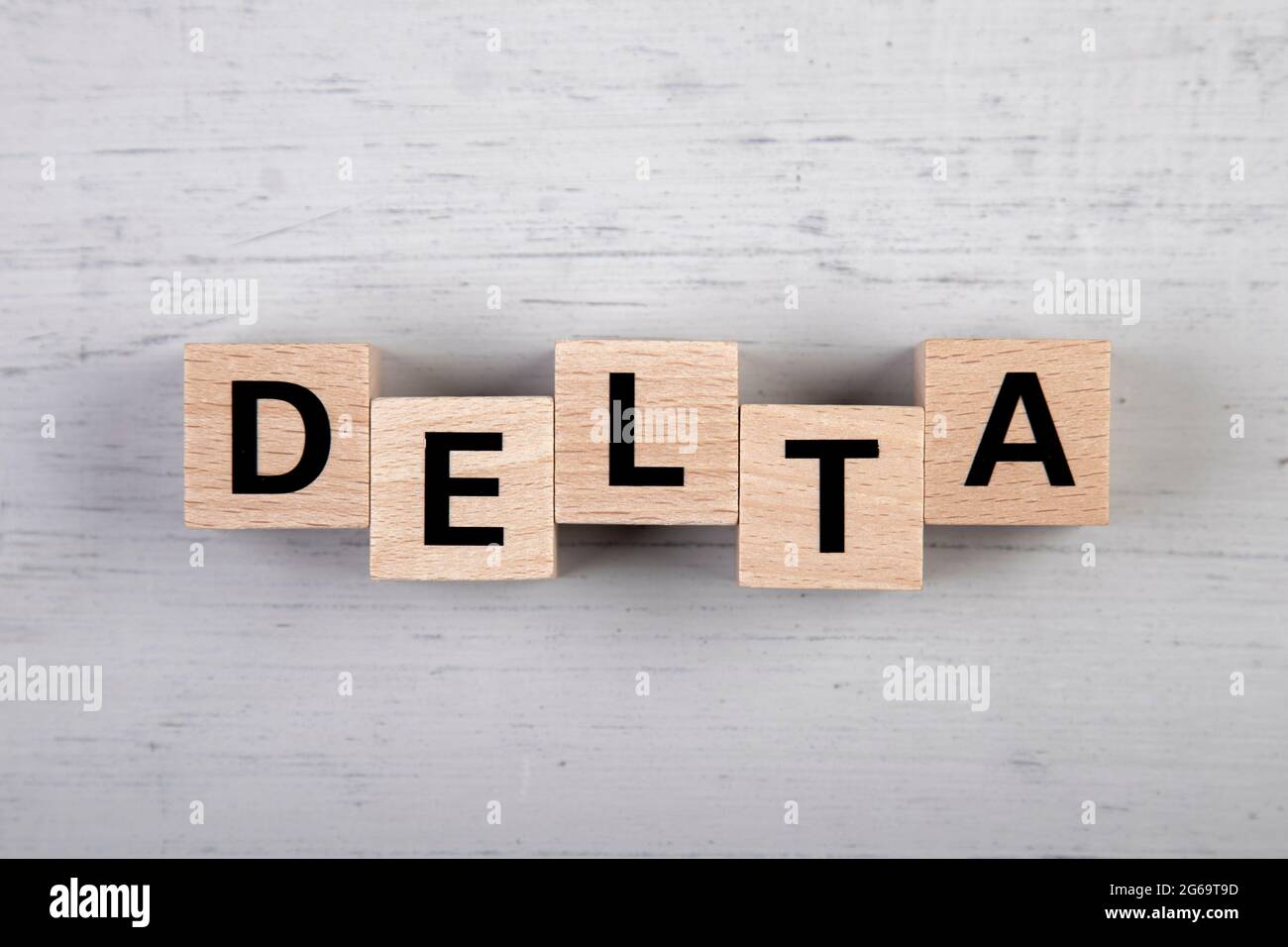 wooden blocks with the word delta Stock Photo - Alamy