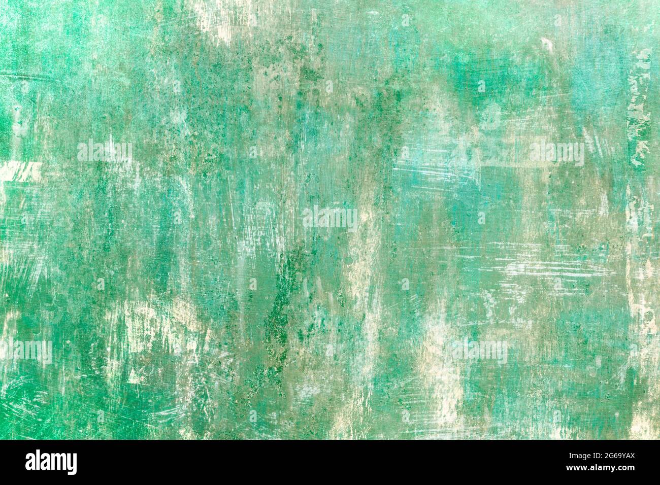 Green distressed backdrop grunge background or texture Stock Photo