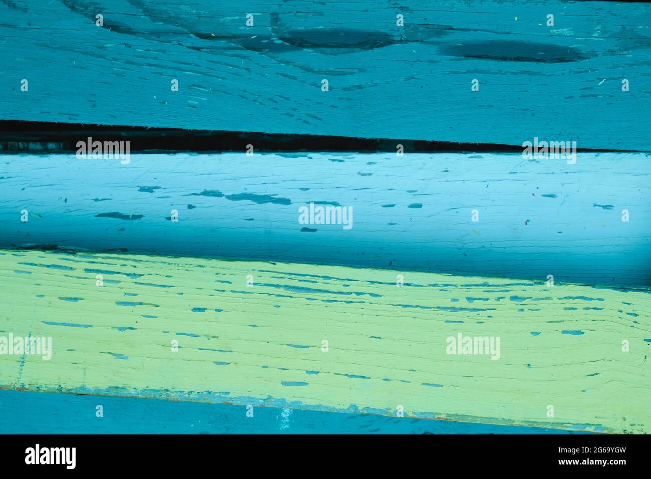Distressed blue and green painted wooden planks abstract background Stock Photo
