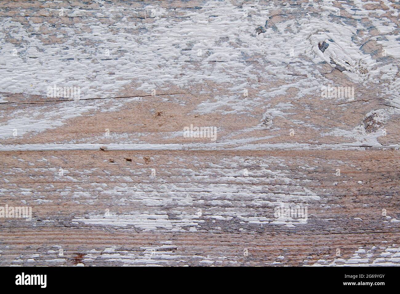 Old distressed wooden surface with white peeling plaster paint grunge ...