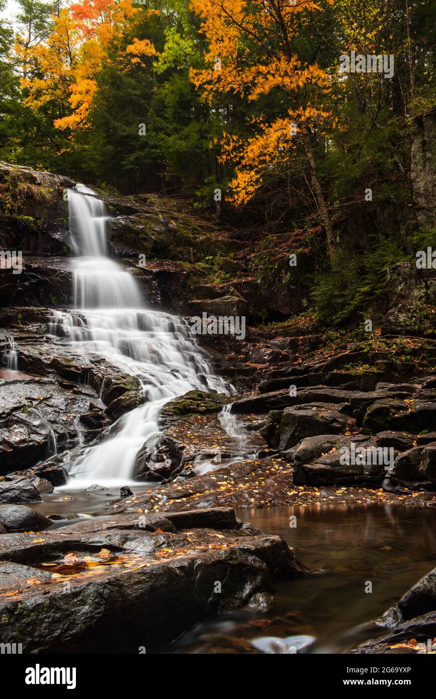 Shelving rock falls at fall Stock Photo