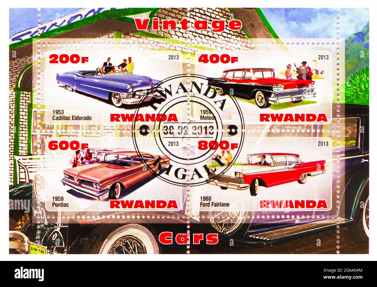 MOSCOW, RUSSIA - MARCH 28, 2020: Four postage stamp printed in Rwanda shows Vintage cars serie, circa 2013 Stock Photo
