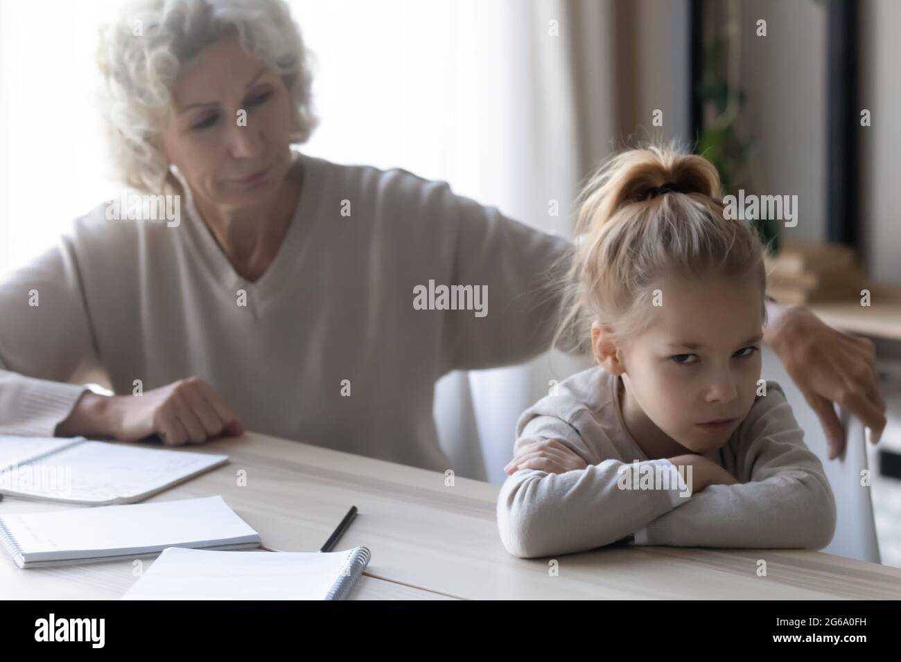 Child refusing teacher hi-res stock photography and images - Alamy