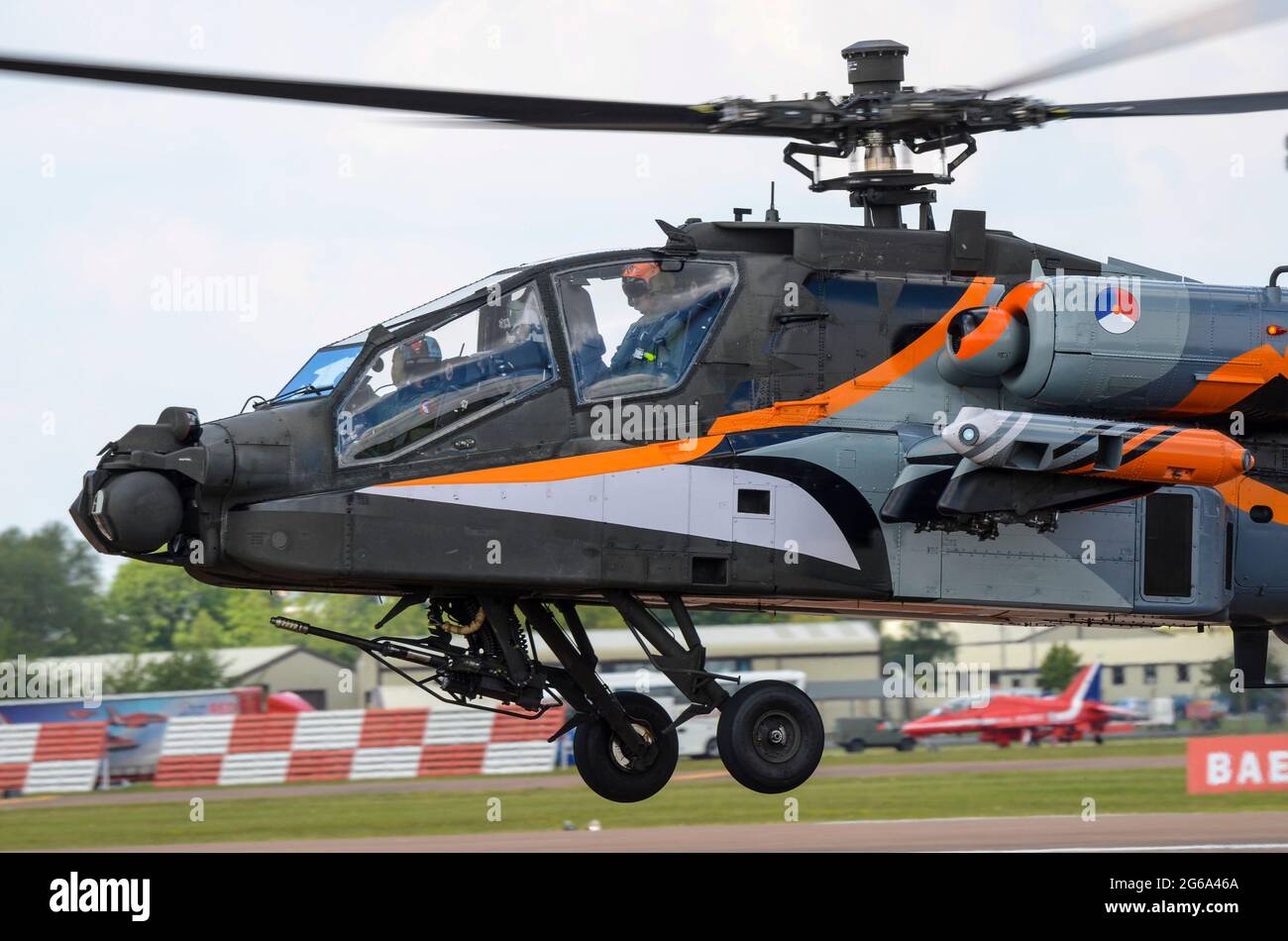 Royal Netherlands Air Force Boeing AH-64D Apache gunship attack helicopter at RIAT airshow, RAF Fairford, in special national colours display finish Stock Photo