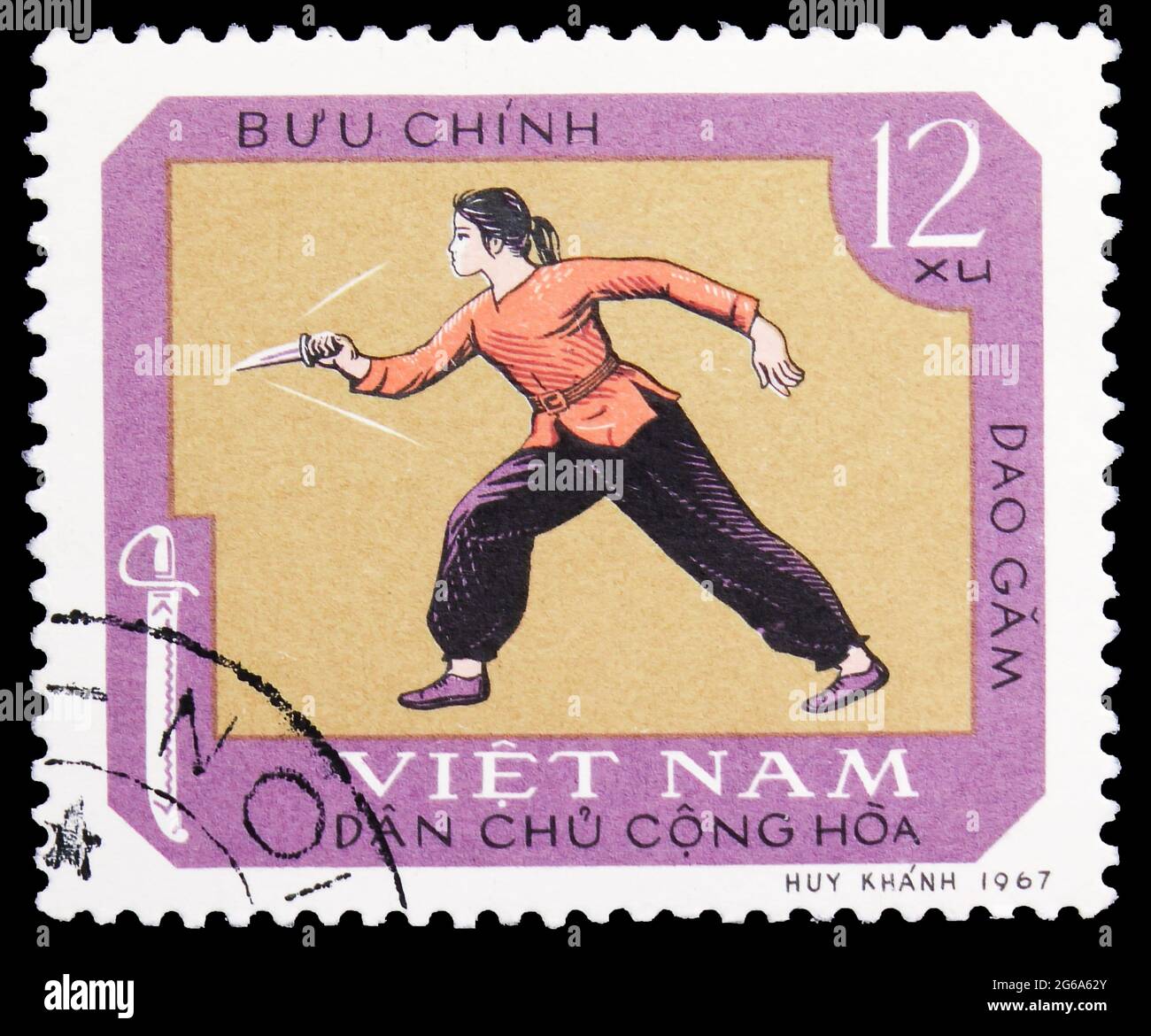 MOSCOW, RUSSIA - APRIL 18, 2020: Postage stamp printed in Vietnam shows Dao Gam, Dagger Fencer, Traditional national sport serie, circa 1968 Stock Photo