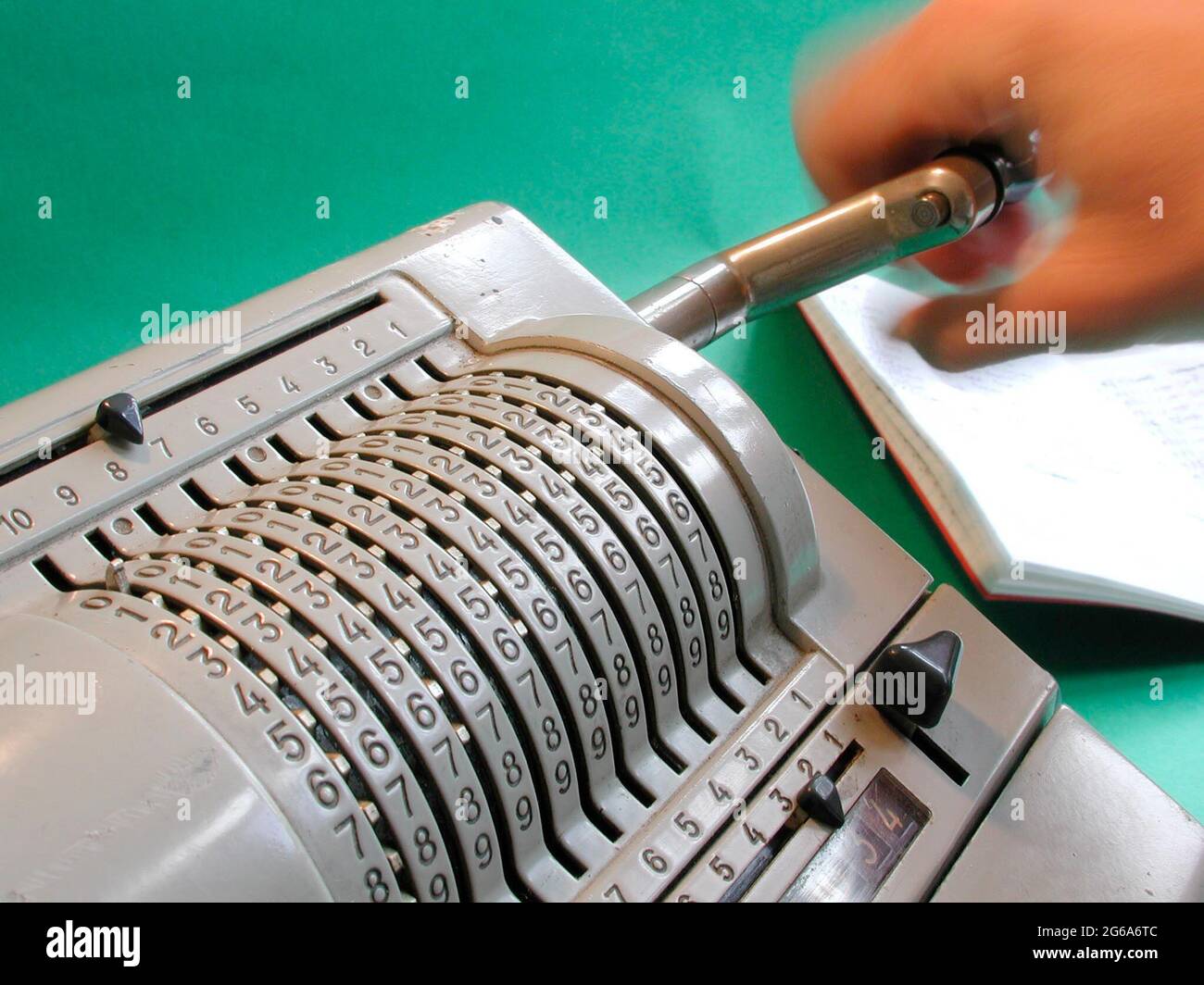 mechanical calculator operated manually by handle branded original