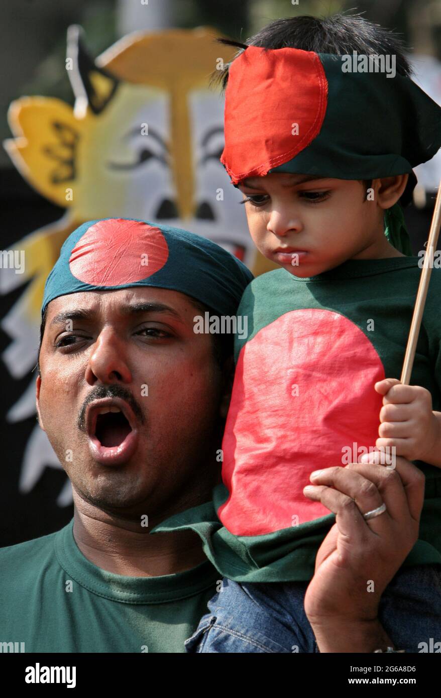 Bangladeshi cultural activists singing  during the victory day at the central Shaheed Minar, Dhaka, Bangladesh 16 December 2007. The whole nation celebrates the Bangladeshi cultural activists singing  during the victory day at the central Shaheed Minar, Dhaka, Bangladesh. December 16, 2007. The whole nation celebrates the 36th victory anniversary over Pakistani occupation forces with the demand for trial of the war criminals across the country. Stock Photo