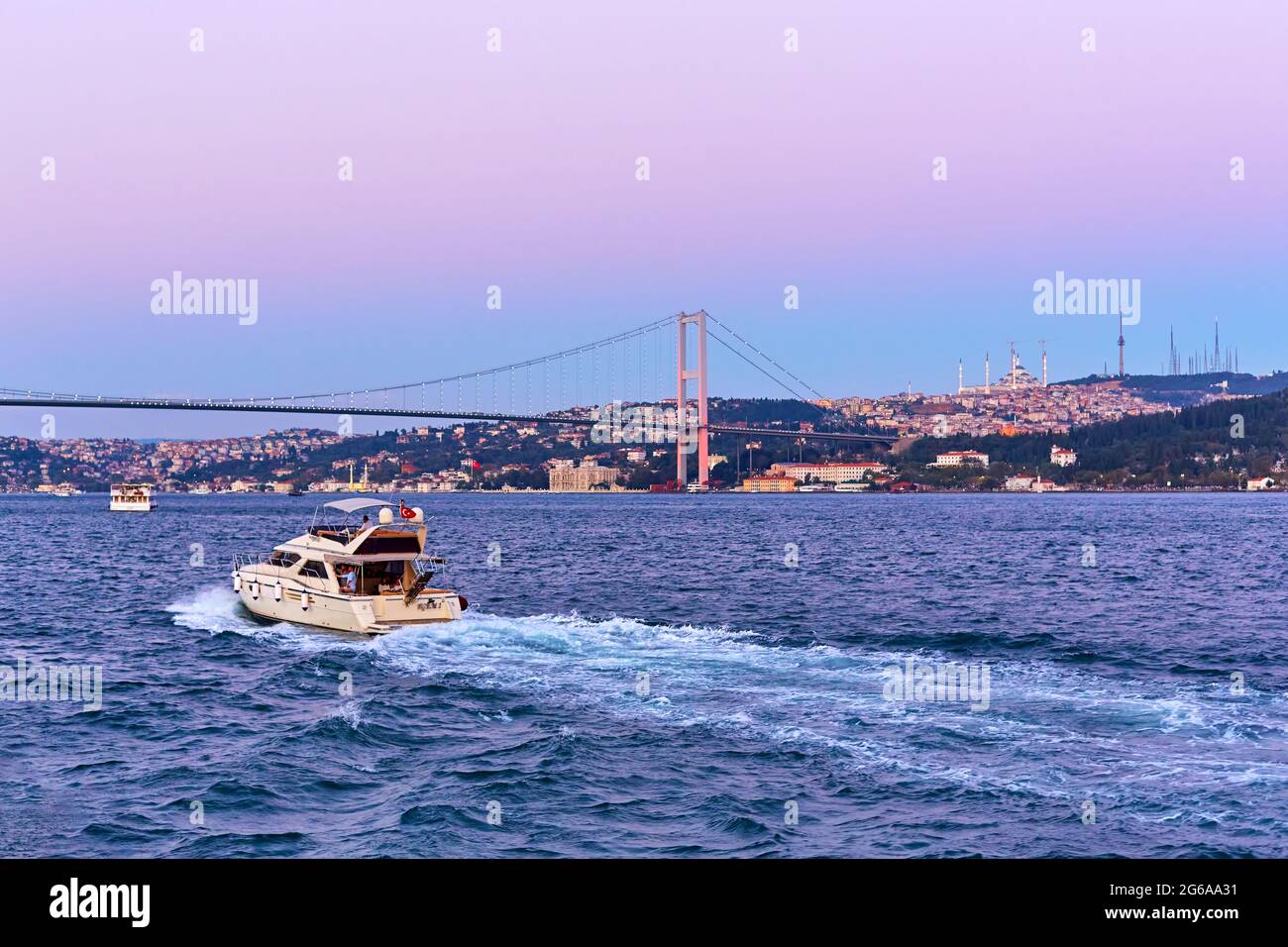 the ship sails at sunset on the Bosphorus Strait in Istanbul. Istanbul ...