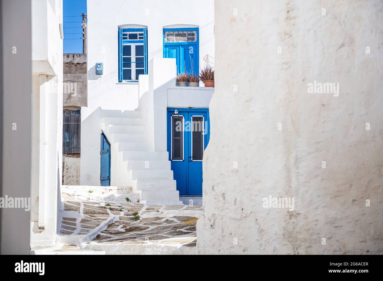 Cyclades Kythnos island, Greece. Whitewashed buildings, narrow ...