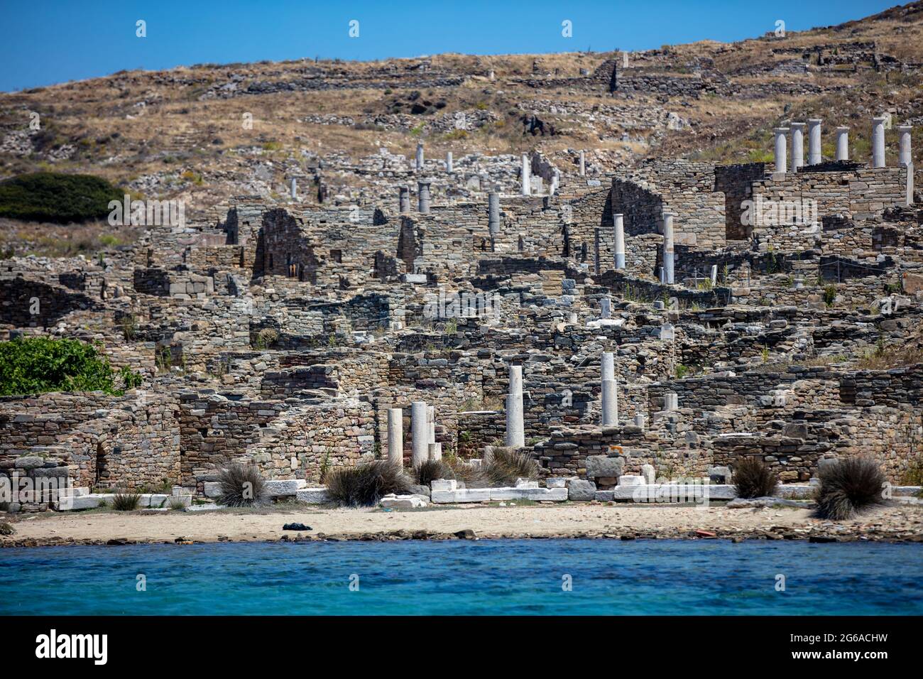 Delos Greece. the sacred Cyclades island, general view from the sea. Ancient civilization seaside ruins, archaeological site on UNESCO World Heritage Stock Photo
