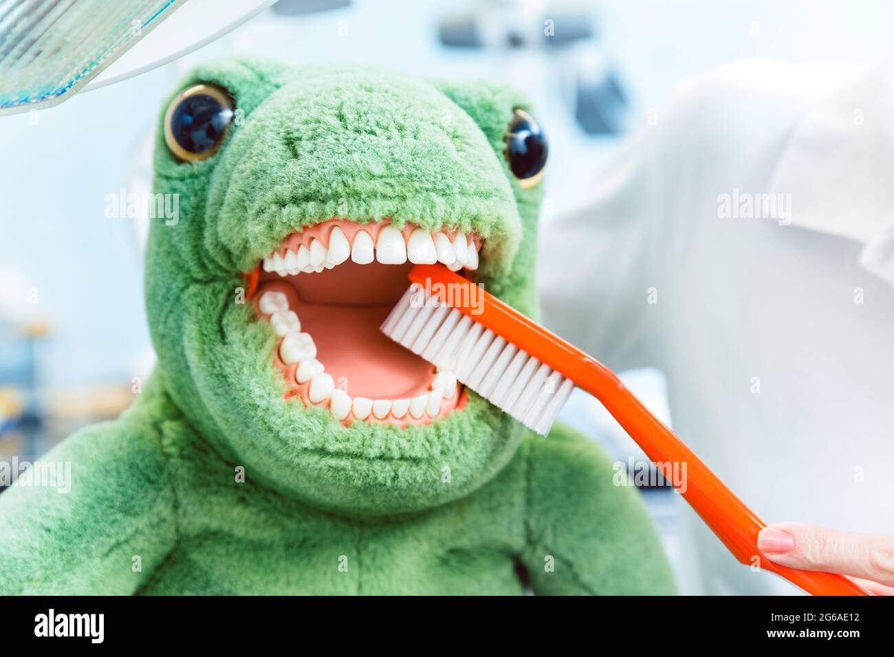 Giant brush in stuffed toy's mouth Stock Photo Alamy