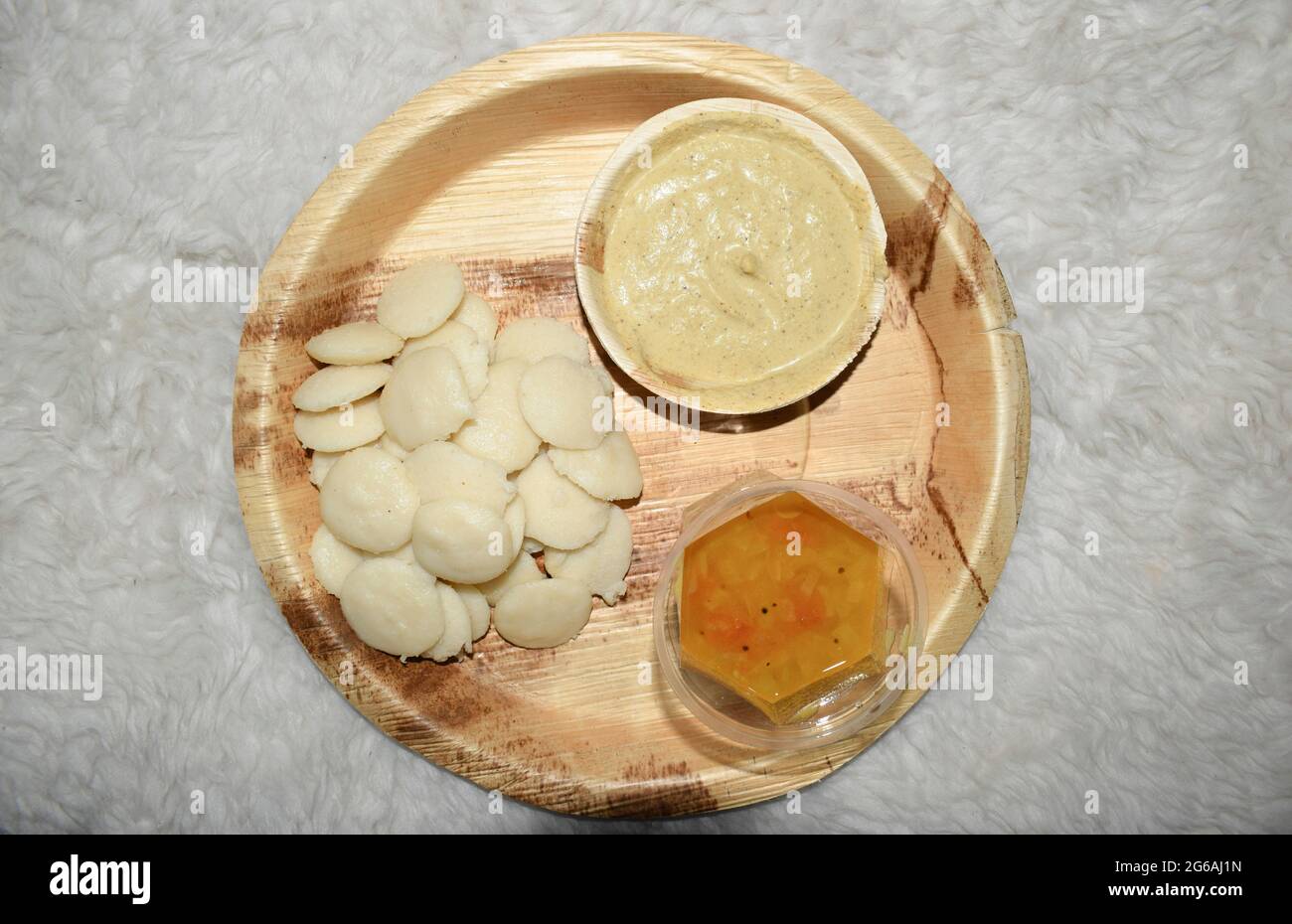 Delicious Mini button idli with hot Sambar and mungfali peanut chutney