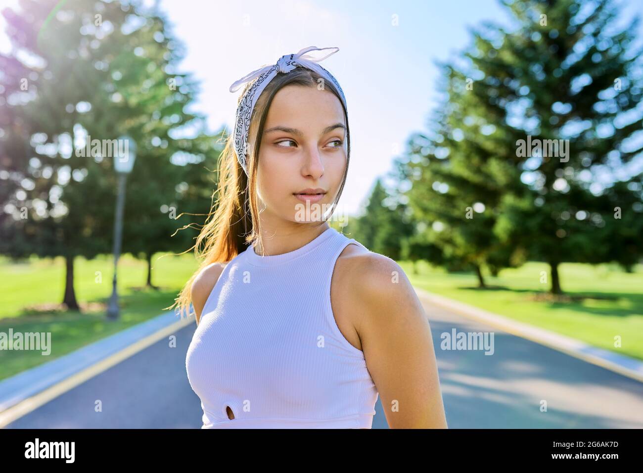 Portrait of beautiful smiling young female outdoors Stock Photo - Alamy