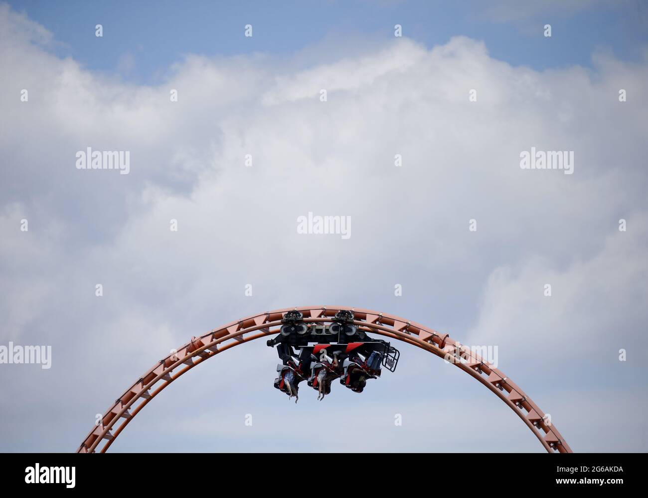 Coney Island, United States. 04th July, 2021. People ride upsidedown on the Thunderbolt Roller