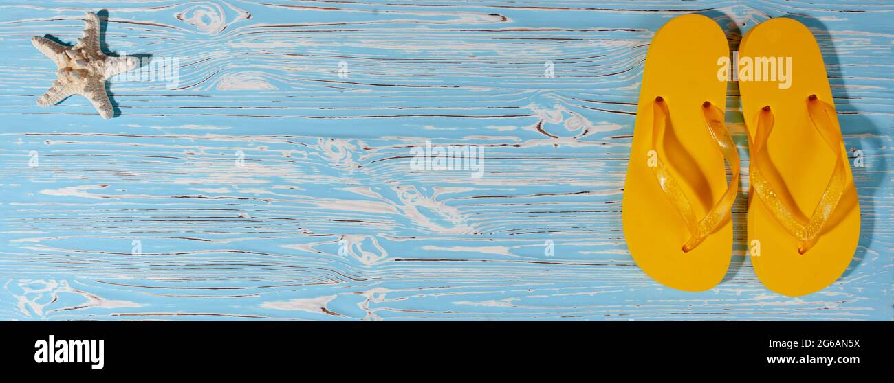 Woman on beach flip flops hi-res stock photography and images - Alamy