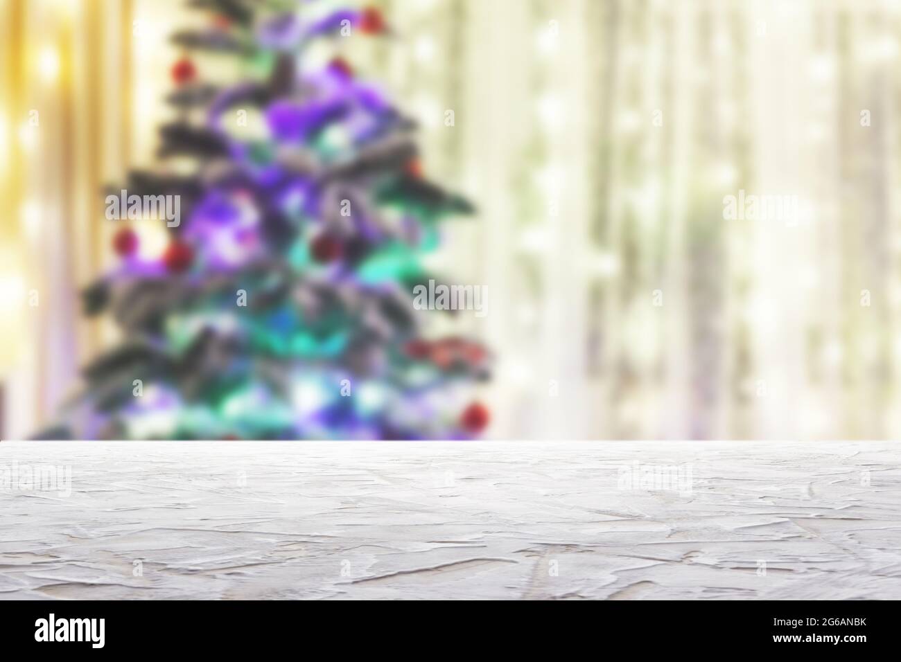 textured-white-surface-on-blur-christmas-tree-with-garlands-background