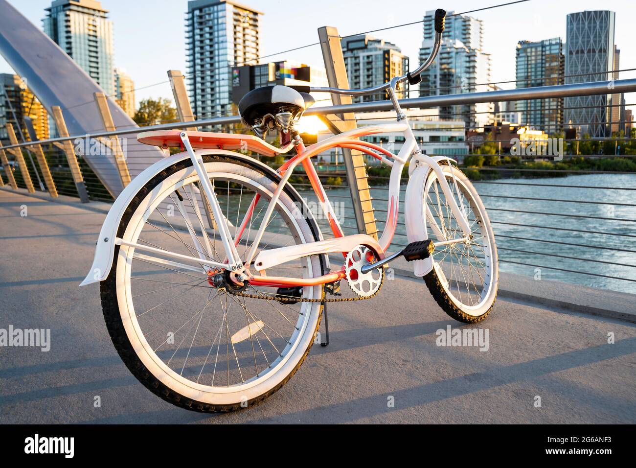 A vintage ladies cruiser bicycle parked on a pedestrian walkway over the  Bow River in Calgary Alberta Canada Stock Photo - Alamy