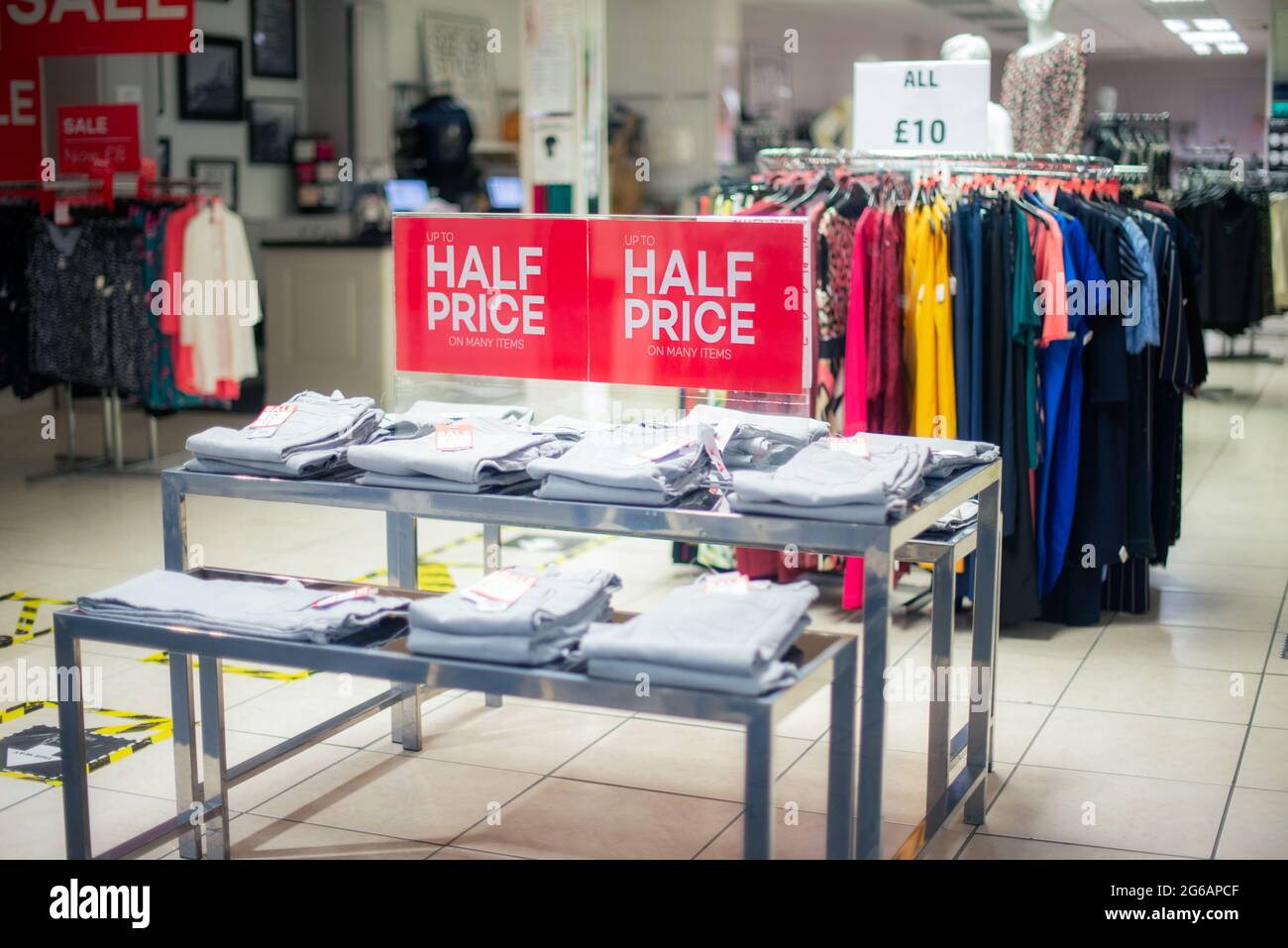 Sale sign in the clothing shop. Big discount because of the store closing. Discount outlet. Black friday, boxing day concept. Selective focus. Copy sp Stock Photo