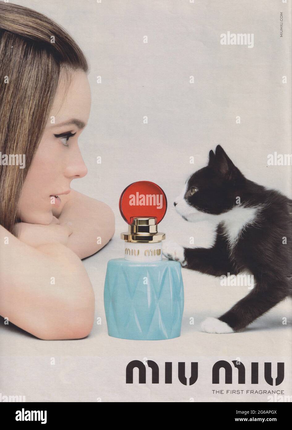 poster advertising Miu Miu The First Fragrance with Stacy Martin in magazine from 2015, advertisement, creative Miu Miu 2010s advert Stock Photo