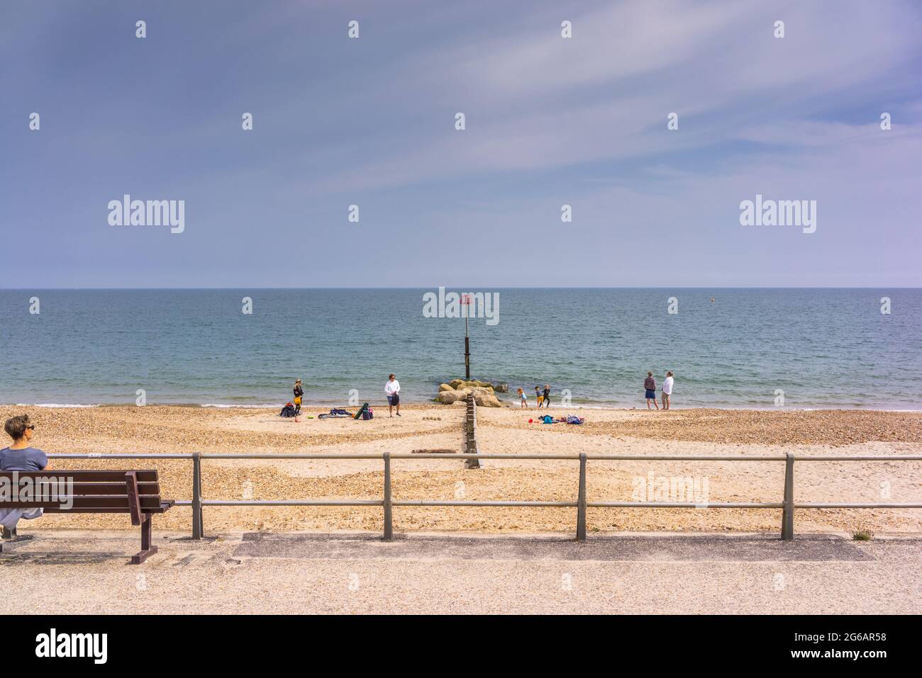 Calm sea at Friars Cliff Beach in Dorset during summer, England, UK Stock Photo