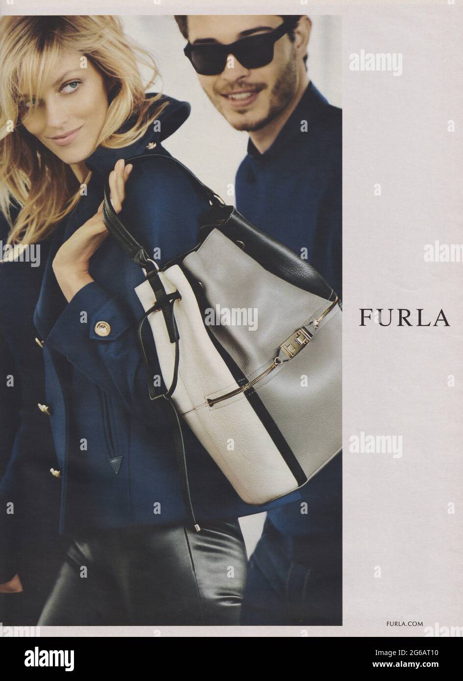 poster advertising Furla fashion house with ANJA RUBIK in paper magazine from 2015 year, advertisement, creative Furla advert from 2010s Stock Photo