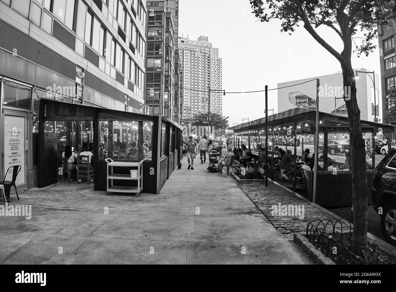 Reopening restaurants in Long Island City's Center BLVD Stock Photo