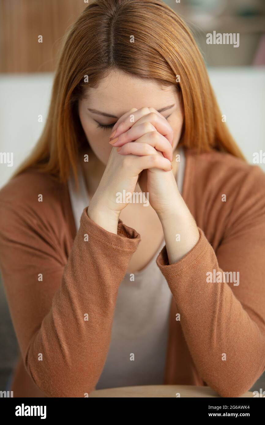 woman hands praying to god Stock Photo