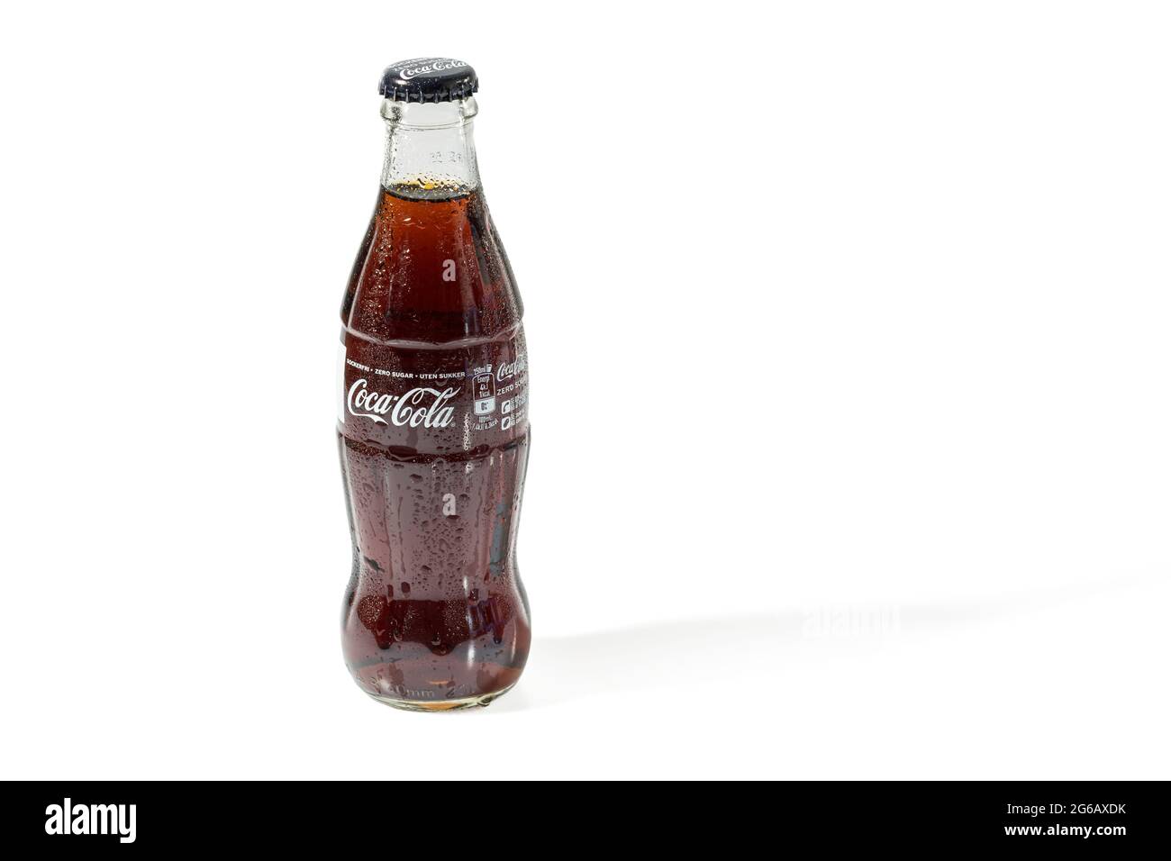 Close up view of Coca Cola in a glass bottle isolated on white background. Stock Photo