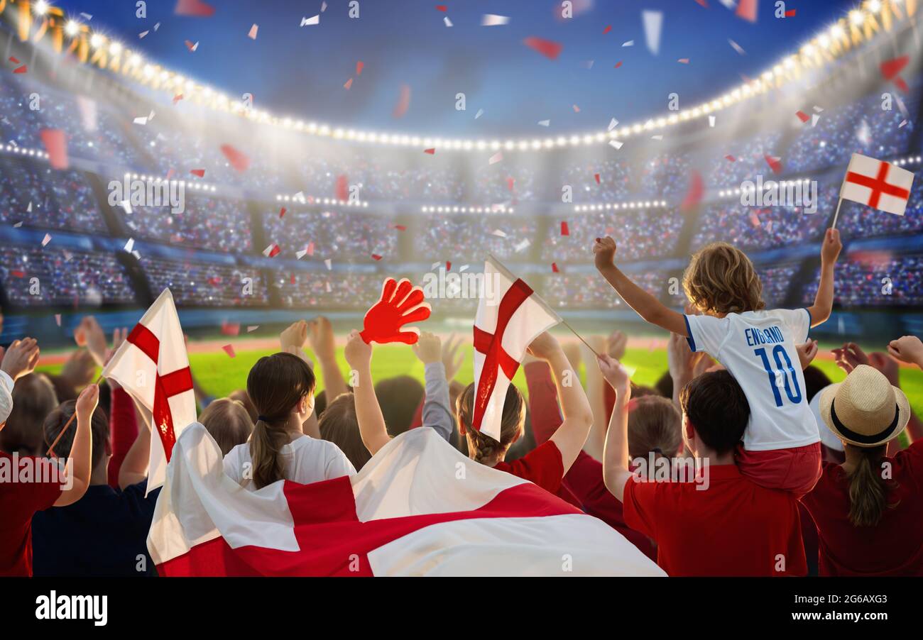 England football supporter on stadium. English fans on pitch team play. Group of British supporters with flag and jersey Stock Photo - Alamy