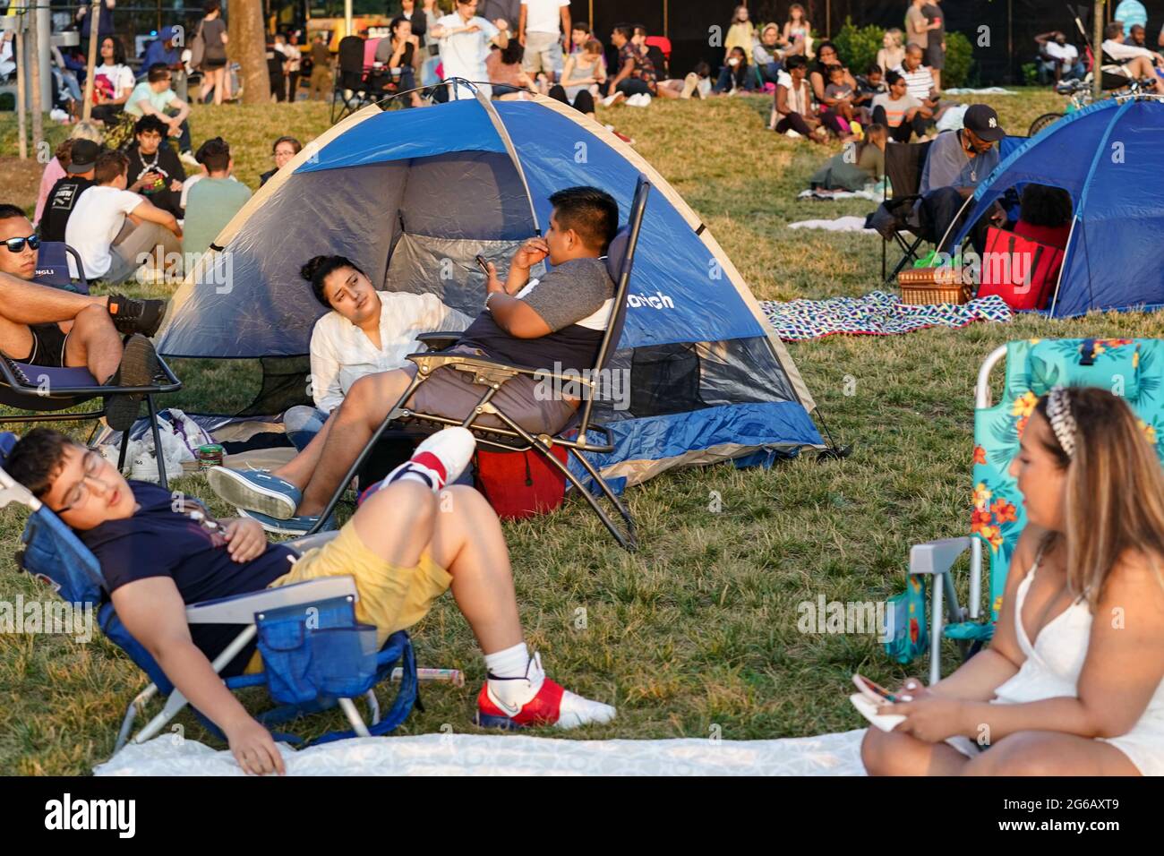 New York, USA. 4th Jul, 2021. Spectators wait at Newtown Barge Park in