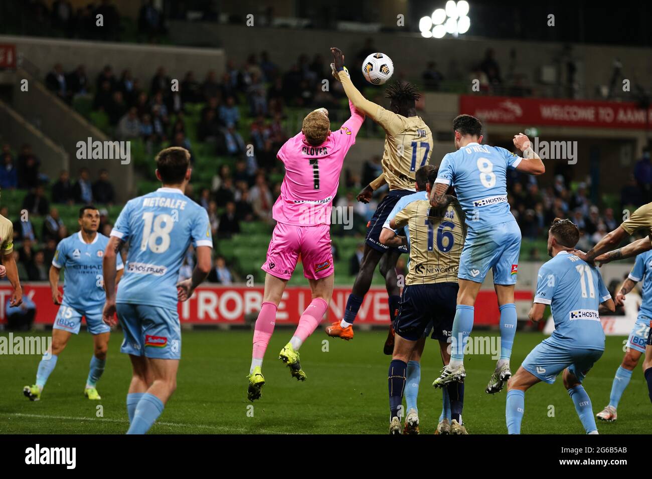 MELBOURNE, AUSTRALIA - APRIL 29: Tom Glover of Melbourne City and Valentino Yuel of Newcastle Jets go for the ball during the Hyundai A-League soccer match between Melbourne City FC and Newcastle Jets on April 29, 2021 at AAMI Park in Melbourne, Australia. (Photo by Dave Hewison) Stock Photo