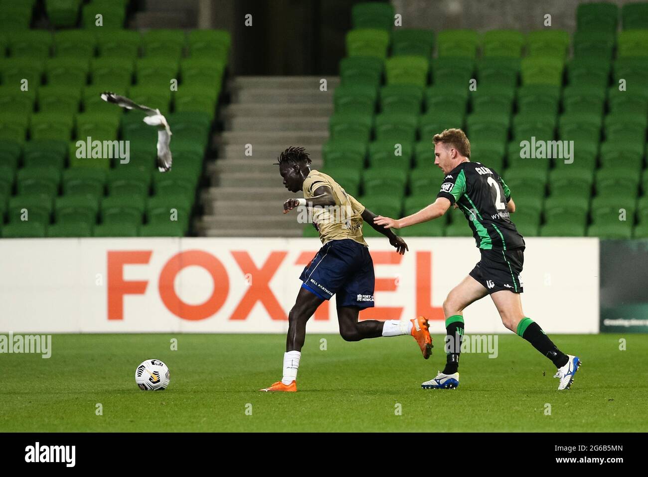 MELBOURNE, AUSTRALIA - APRIL 26: Valentino Yuel of Newcastle Jets controls the ball during the Hyundai A-League soccer match between Western United FC and Newcastle Jets on April, 26, 2021 at AAMI Park in Melbourne, Australia. (Photo by Dave Hewison) Stock Photo