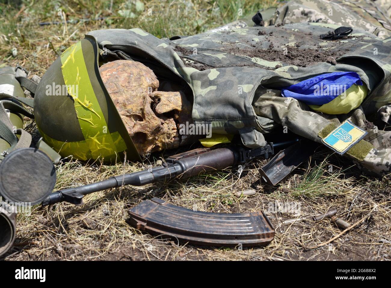 ukraine dead Kramatorsk, Ukraine. 04th July, 2021. (EDITORS NOTE: Image depicts death)  War remains are seen on the installation of battlefield in Slavyansk area  when it was found by the Ukrainian scout group.Celebration of