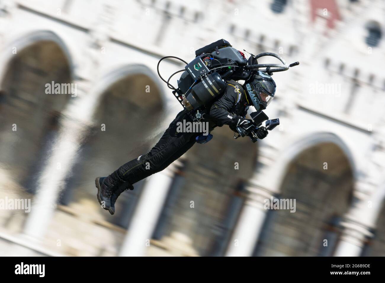 Budapest, Hungary - June 23, 2018: Jet Pack Man flying by Hungarian Parliament Building at Red Bull Air Race (The World Air Sports Federation event) Stock Photo