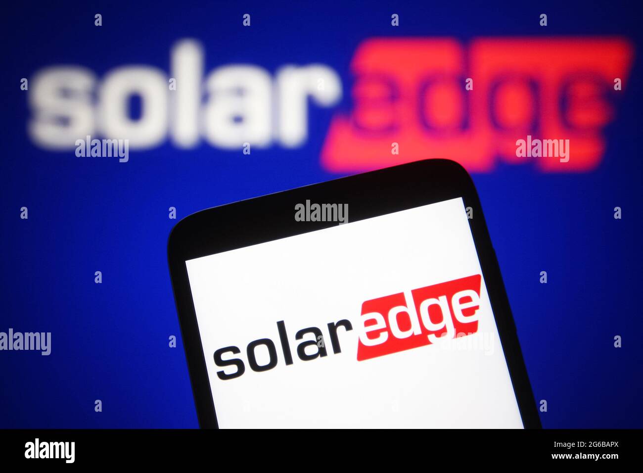 In this photo illustration a SolarEdge Technologies logo is seen on a