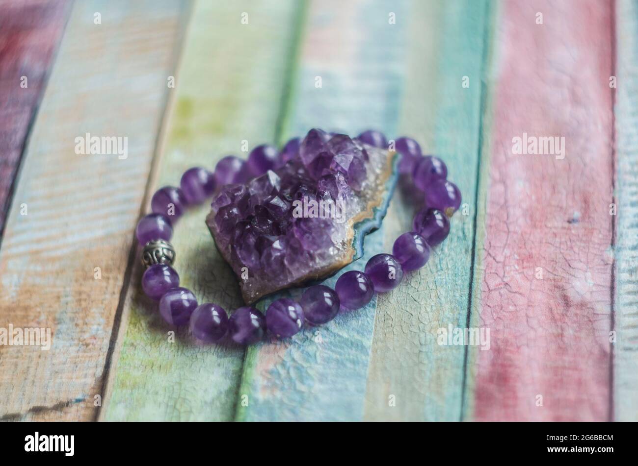 Amethyst druse bracelet purple natural stone jewelry. Photo of natural materials. Stock Photo
