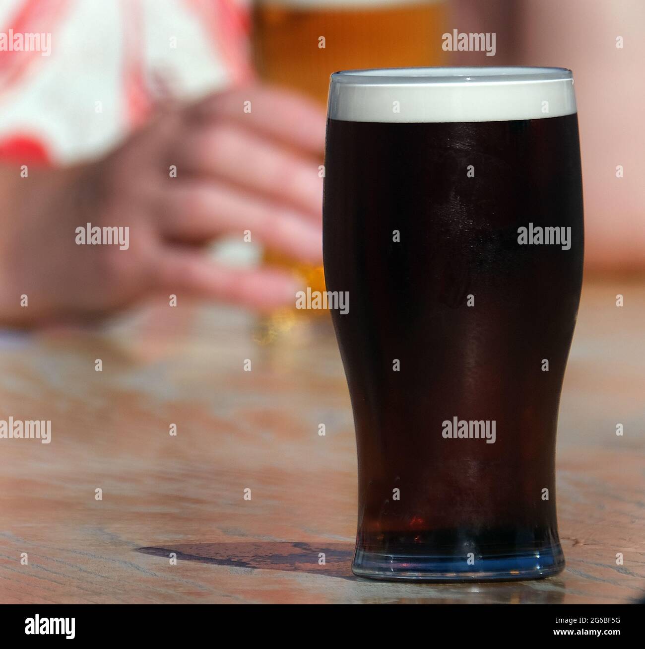 Glasses of beer and lager in public house garden during controlled lockdown Stock Photo Alamy