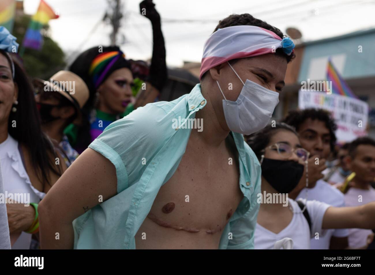 Transexual women, drag men and other members of the LGTBIQ community demonstrate as thousands of members of Barranquilla, Colombia LGTBIQ communities participate in the international pride parade celebrated on June 26, 2021. Stock Photo