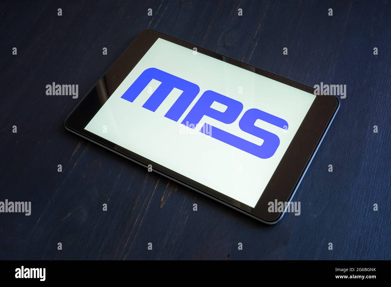 KYIV, UKRAINE - June 30, 2021. Monolithic power systems inc mps logo on the desk. Stock Photo