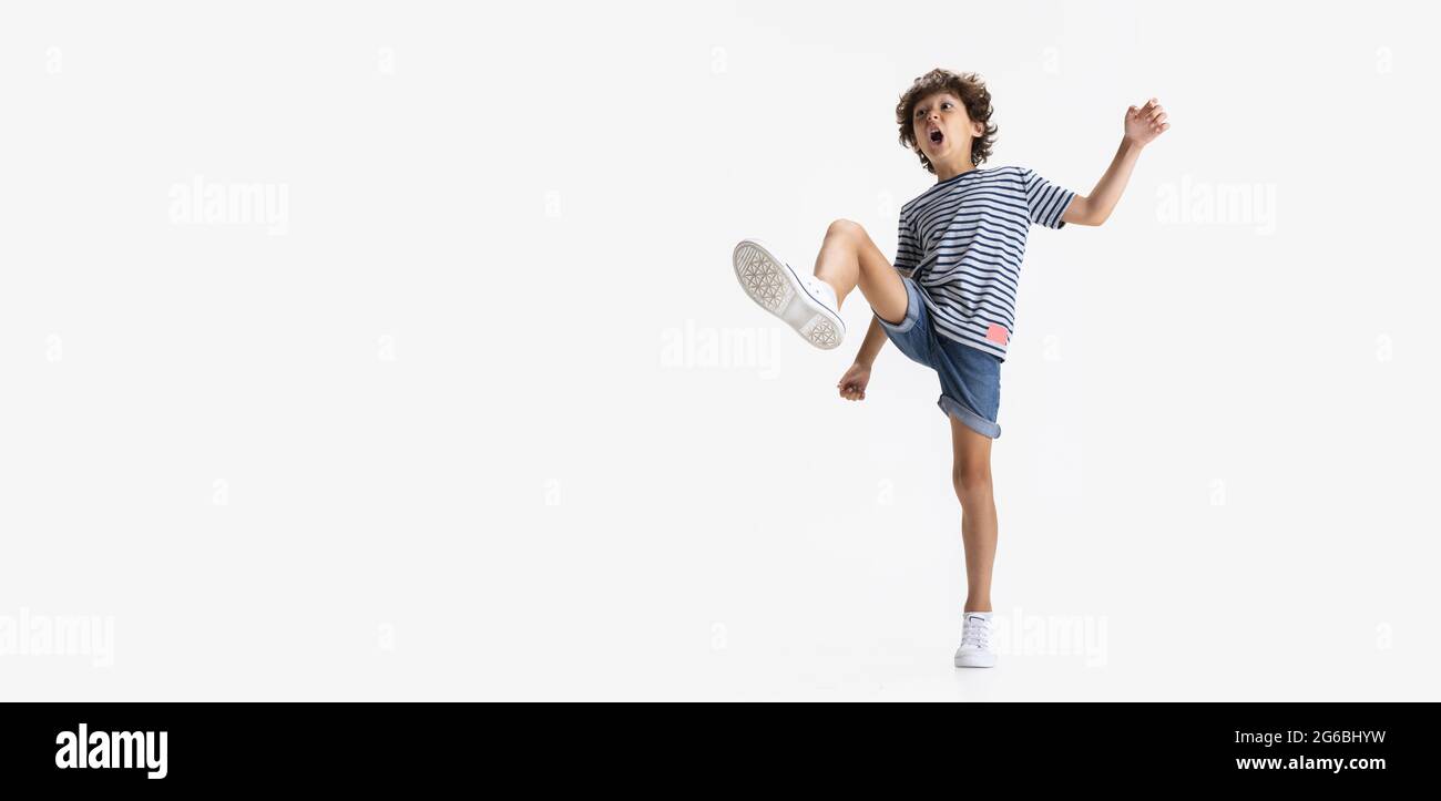 Flyer with portrait of little preschool boy posing isolated over white ...