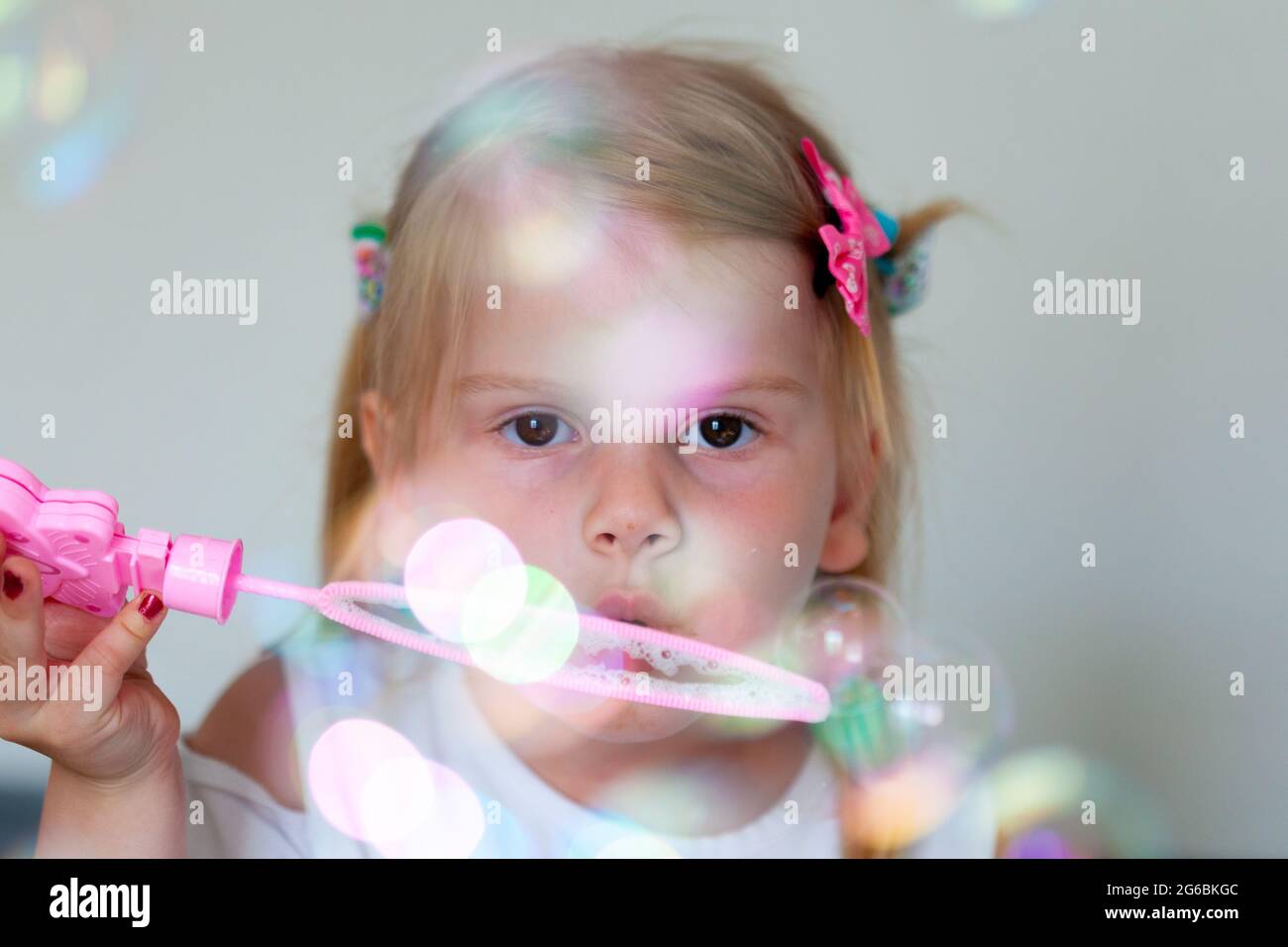 A child blows bubbles, children play with soap bubbles Stock Photo Alamy
