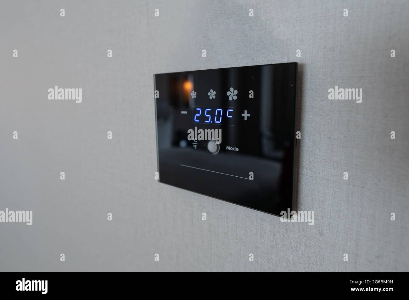 modern digital air condition panel on wall Stock Photo