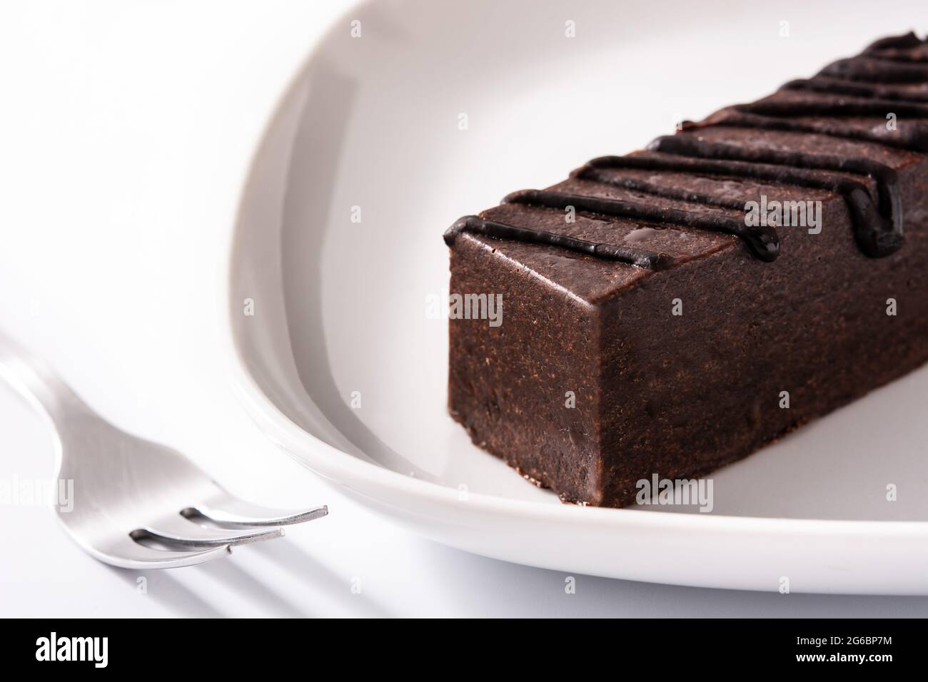 Chocolate cake slice isolated on white background Stock Photo