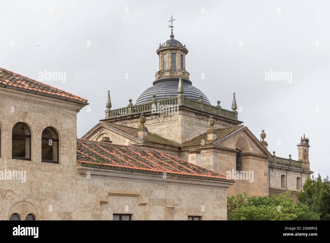 Cuidad Rodrigo / Spain - 05 13 2021: Back view at the dome copula tower at the iconic spanish Romanesque and Renaissance architecture building at the Stock Photo