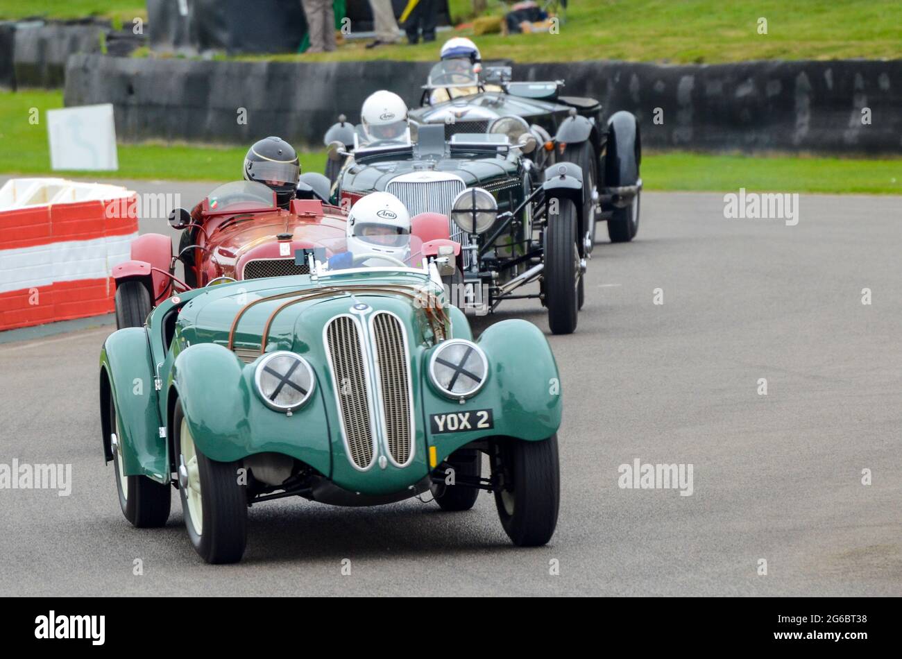 BMW 328 classic, vintage racing car competing in the Brooklands Trophy at the Goodwood Revival historic event, UK. Driven by David Cottingham Stock Photo