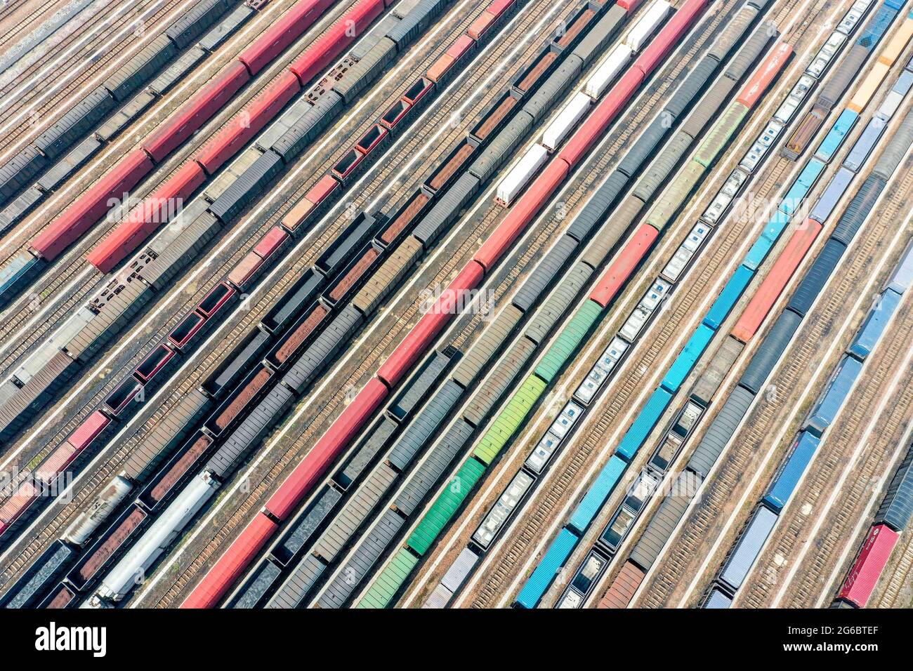 Zhengzhou, Zhengzhou, China. 5th July, 2021. On July 3, 2021, Zhengzhou City, Henan Province, aerial photographs of freight cars at the railway marshalling station of Zhengzhou North Railway Station.Zhengzhou North Railway Station is a special-class station under the jurisdiction of China Railway Zhengzhou Bureau Group Co., Ltd., and an important station connecting Beijing-Guangzhou Railway and Longhai Railway. Construction started in 1959 and completed and put into use in 1963. It mainly handles the arrival, disassembly, marshalling, and departure tasks of freight trains on the Beijing-Guan Stock Photo