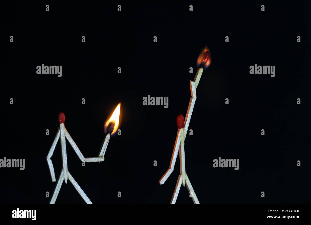 A miniature art with matches that depicts the story of two fighters fighting. Matchstick men fighting each other. Matchstick art photography. Stock Photo