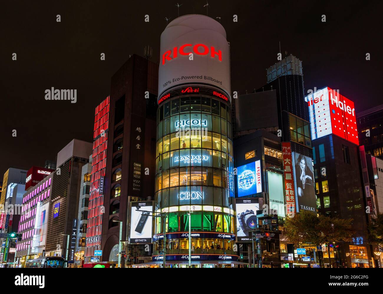 Night at the famous and iconic Ginza Crossroad in Tokyo, with colorful billboards and luxury stores Stock Photo