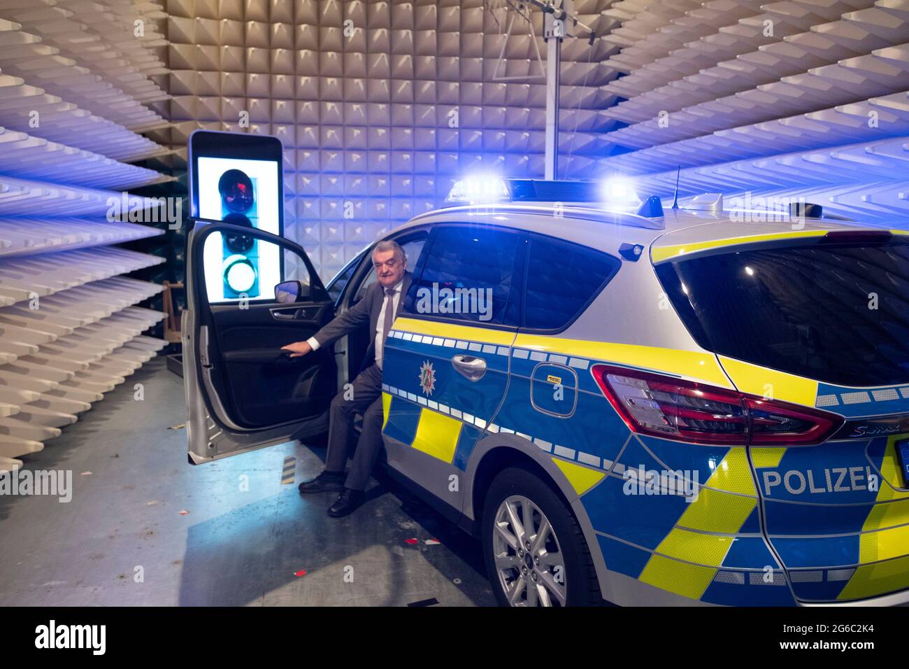 Duisburg, Deutschland. 25th June, 2021. Herbert REUL, politician, CDU,  Interior Minister of the State of North Rhine-Westphalia, sits in a police  patrol car, North Rhine-Westphalia Interior Minister Herbert Reul visits  the LZPD