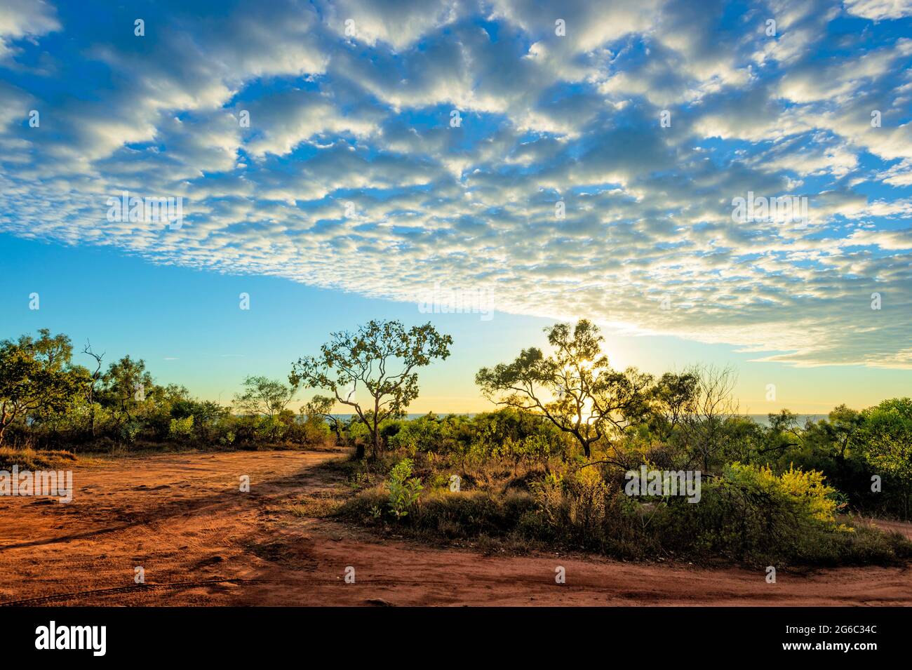 Atmospheric sunrise with mackerel sky, Pender Bay Escape, Dampier Peninsula, Western Australia, WA, Australia Stock Photo